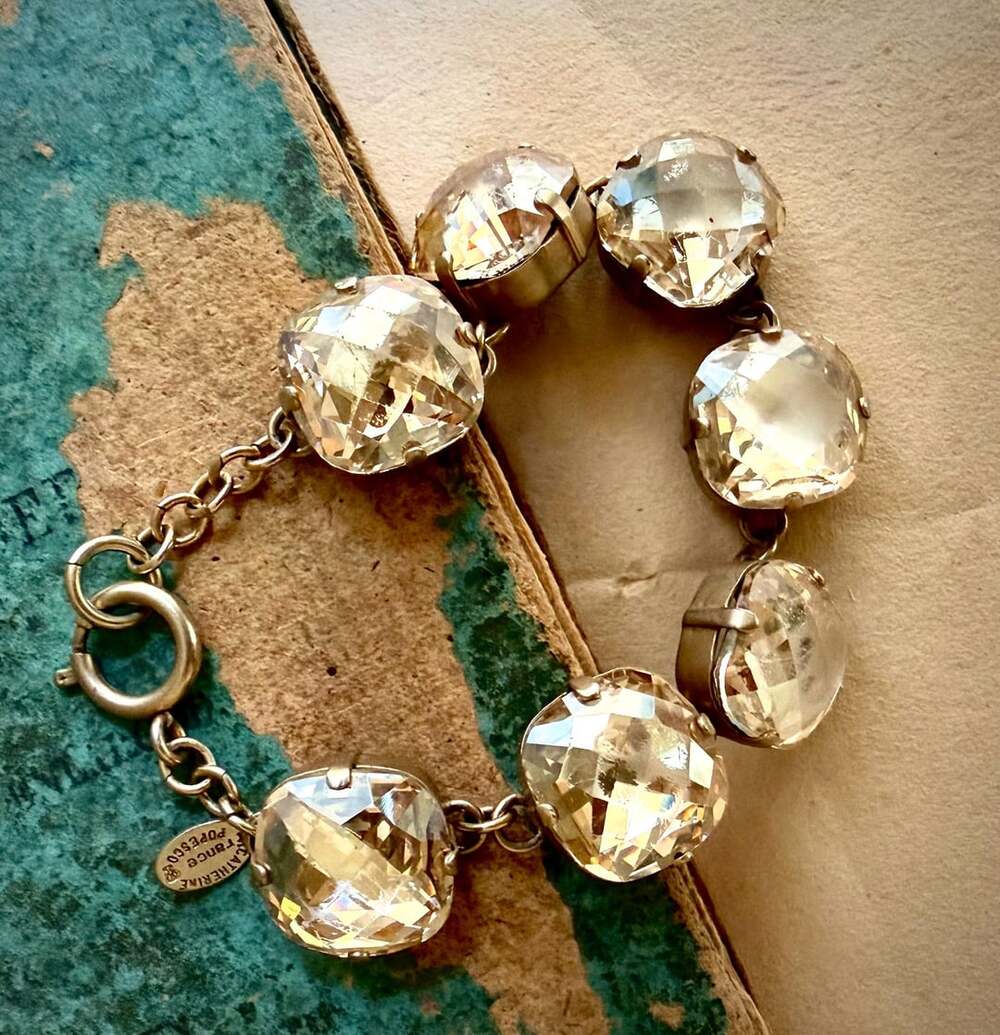 Catherine Popeseco (La Vie Parisienne) crystal link bracelet featuring large fac